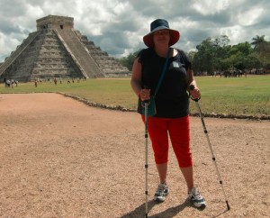 Woman in front of Mayan pyramid